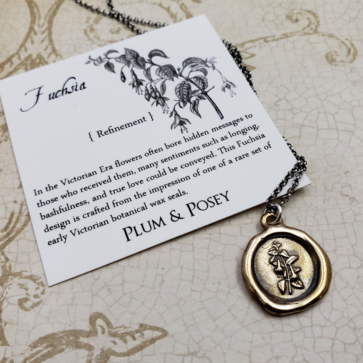 Fuchsia flower necklace in bronze