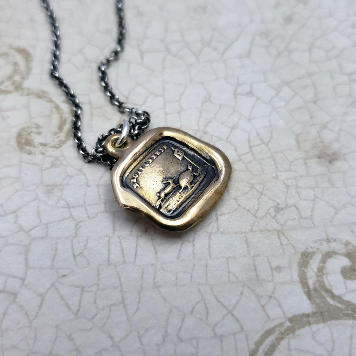 Tortoise and the Hare Pendant in Bronze