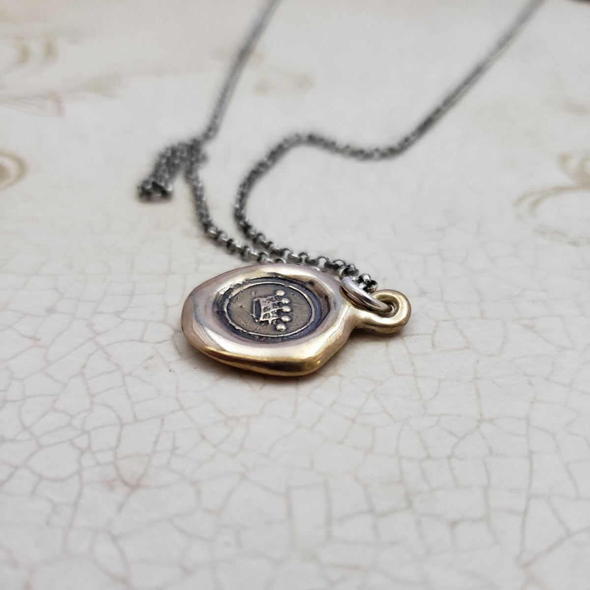 Crown Pendant in Bronze