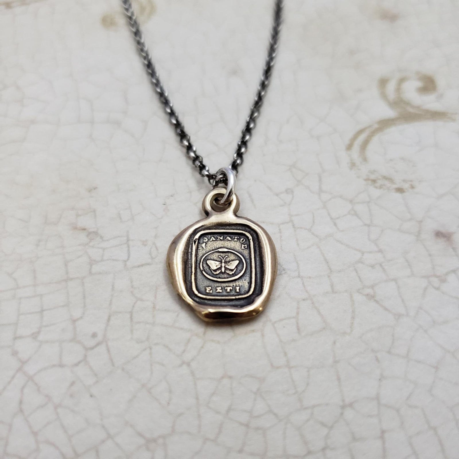 Butterfly & Ouroboros in Bronze