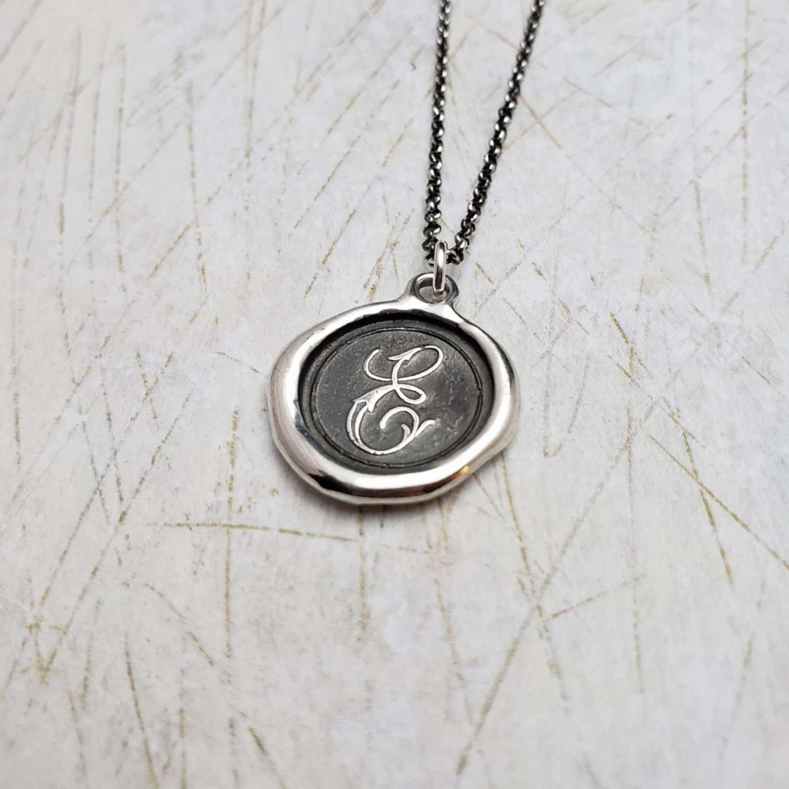 Initial E