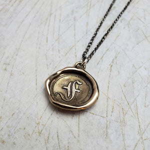 Initial F in Bronze