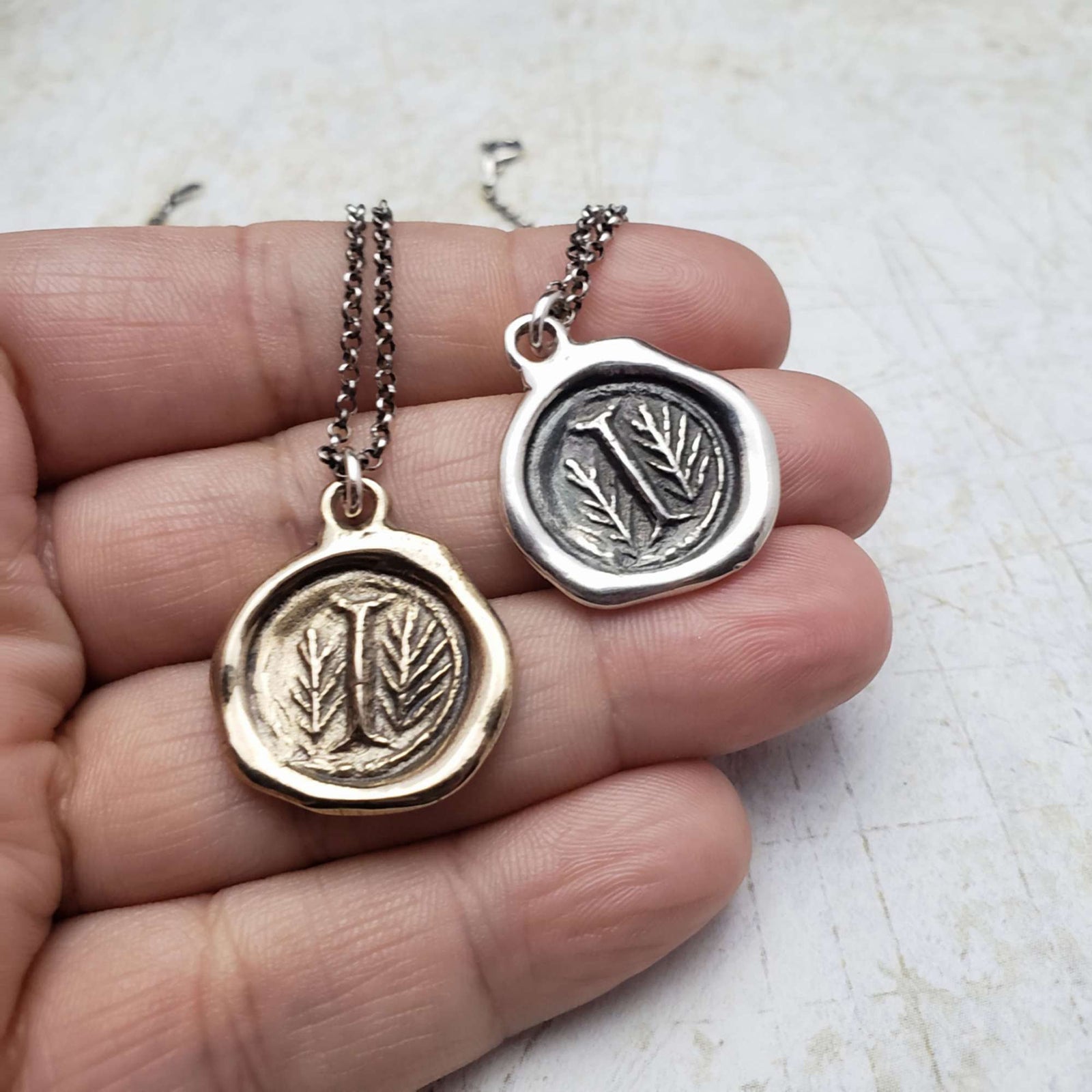 Initial I in Bronze