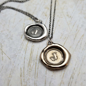Initial J in Bronze