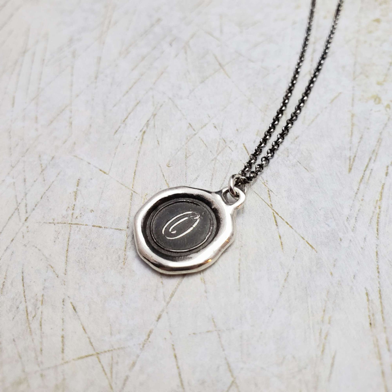 Initial O