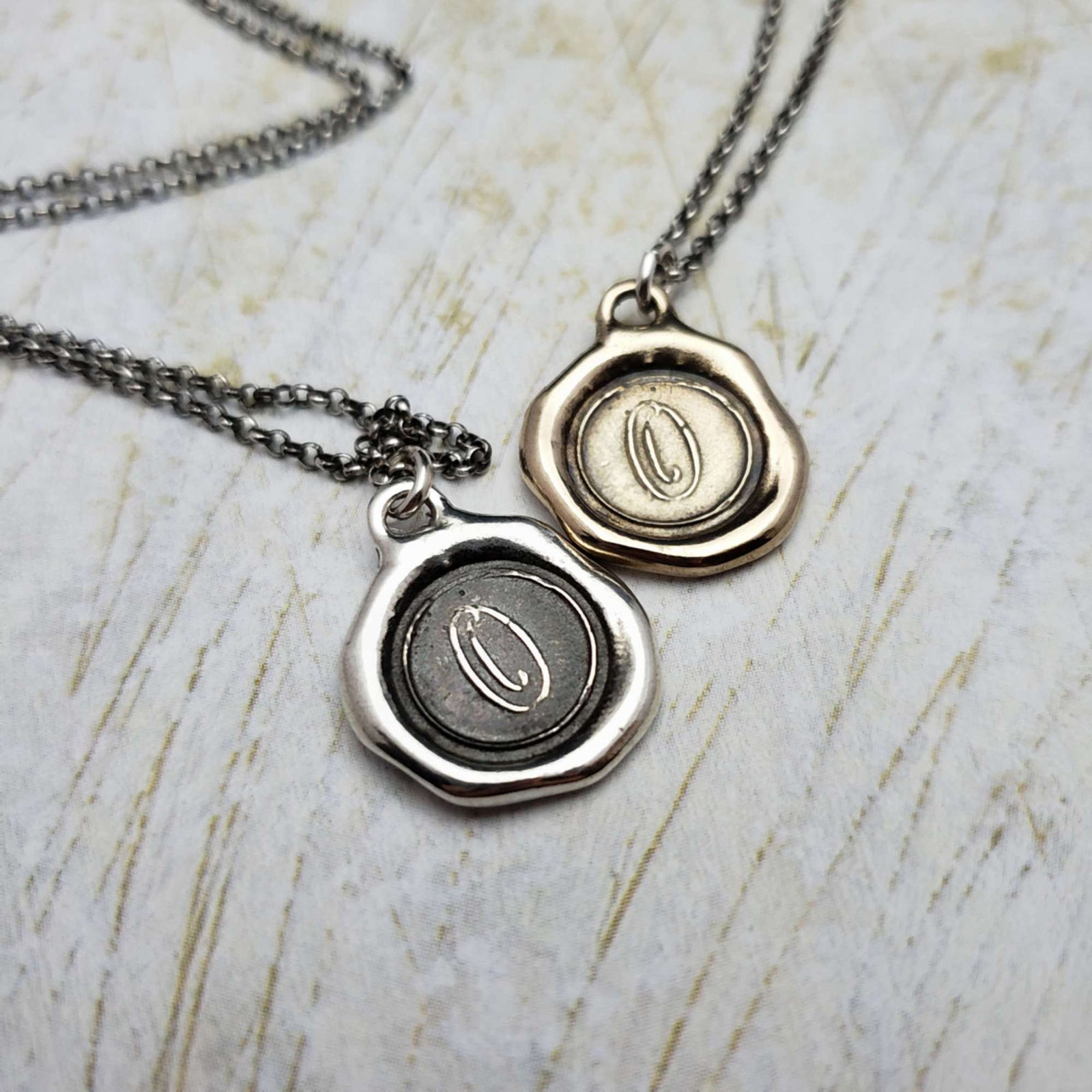 Initial O in Bronze