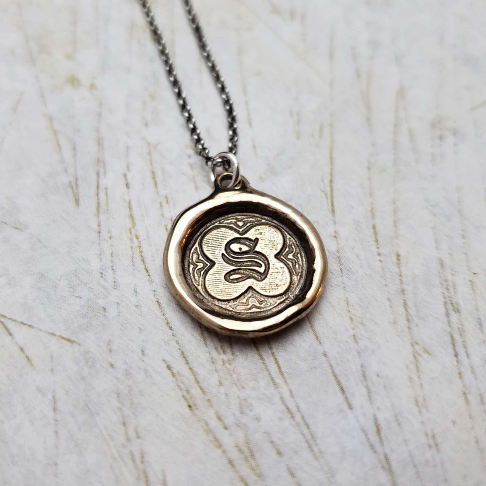 Initial S in Bronze