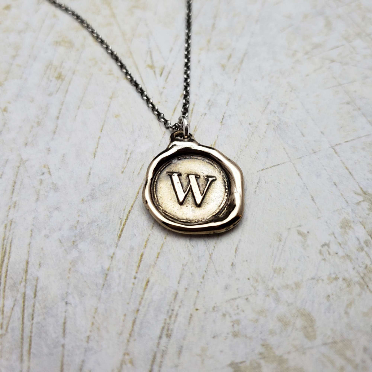 Initial W in Bronze