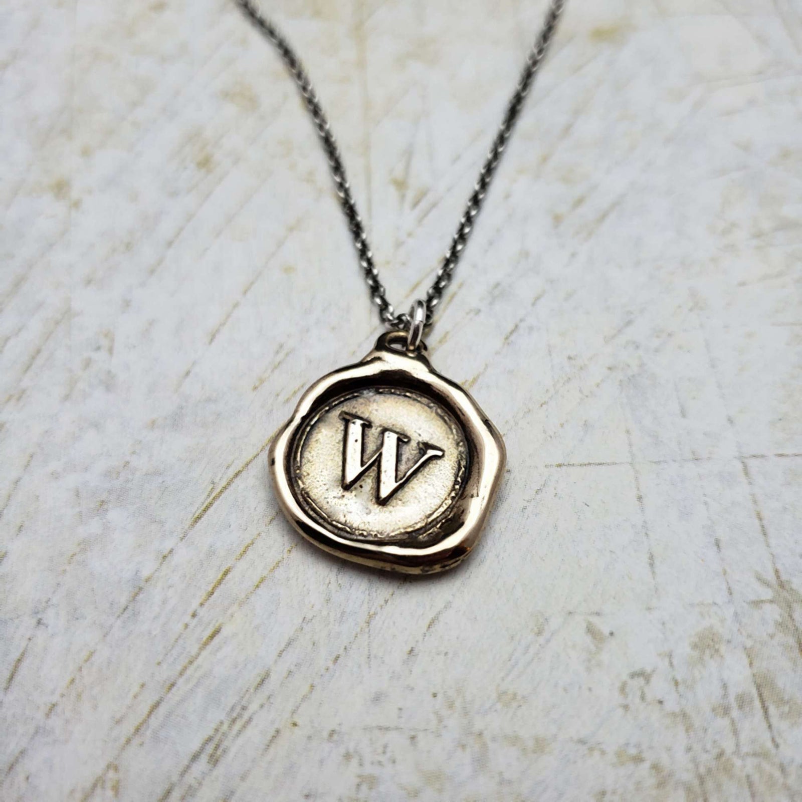 Initial W in Bronze