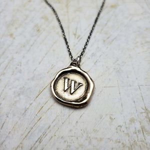 Initial W in Bronze