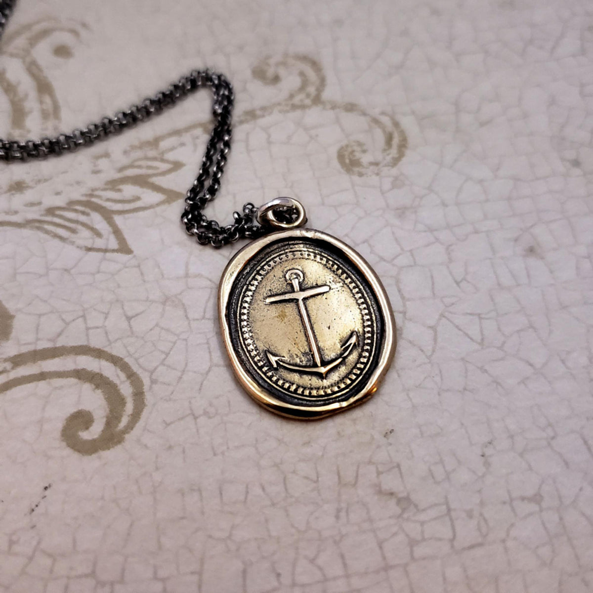 Mariners cross anchor - hope and faith in bronze