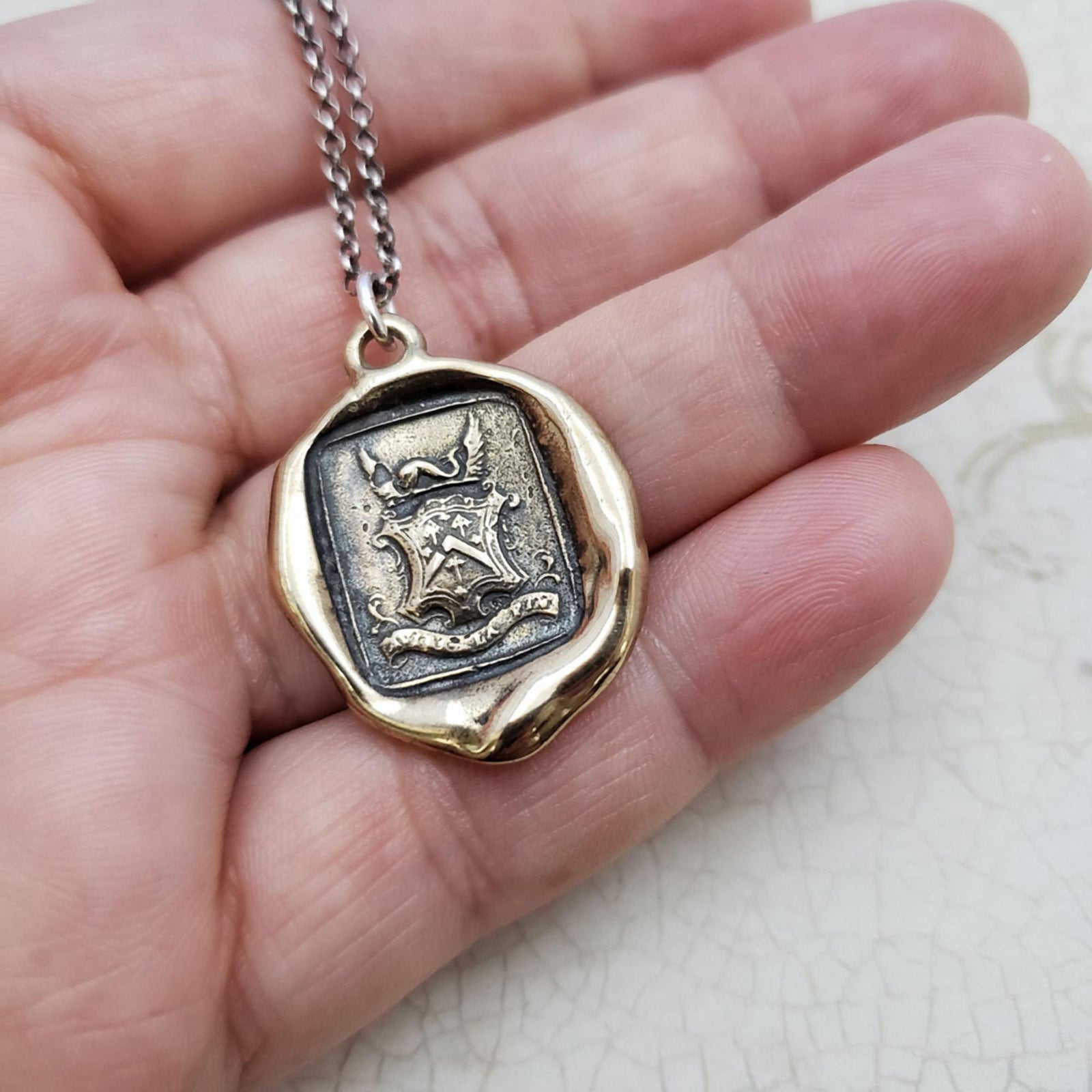 Dolphin Crest  ~ Consider the End in Bronze