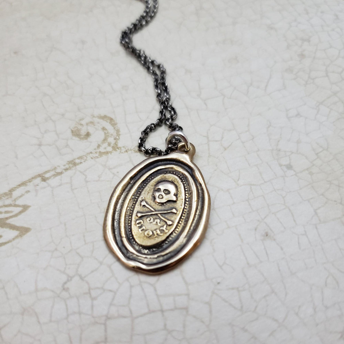 Death or Glory Skull and Crossbones in bronze