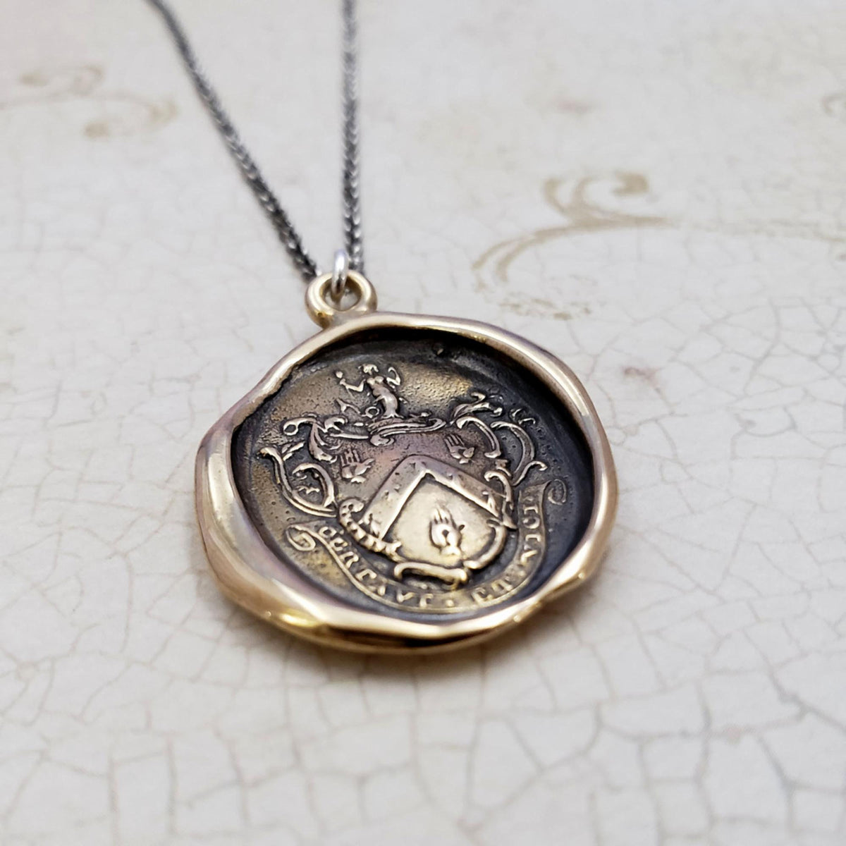 Mermaid - &#39;I have fought and conquered&#39; in bronze