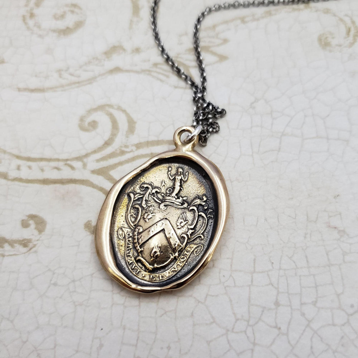 Mermaid - &#39;I have fought and conquered&#39; in bronze