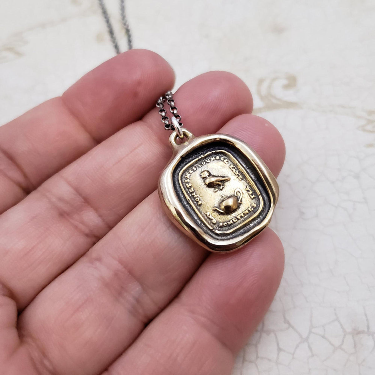 Council and Comfort, Owl and Teapot wax seal pendant in Bronze