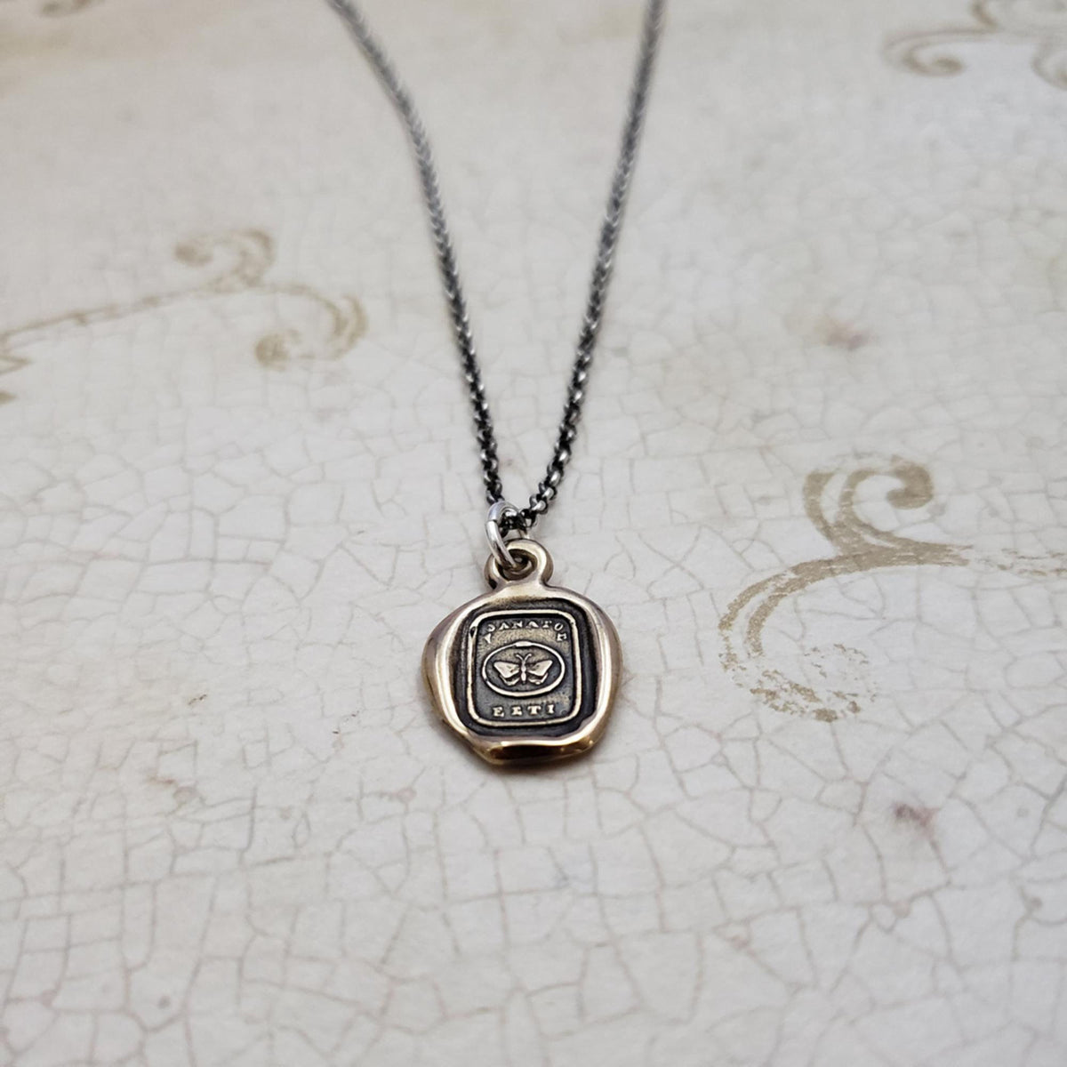 Butterfly &amp; Ouroboros in Bronze