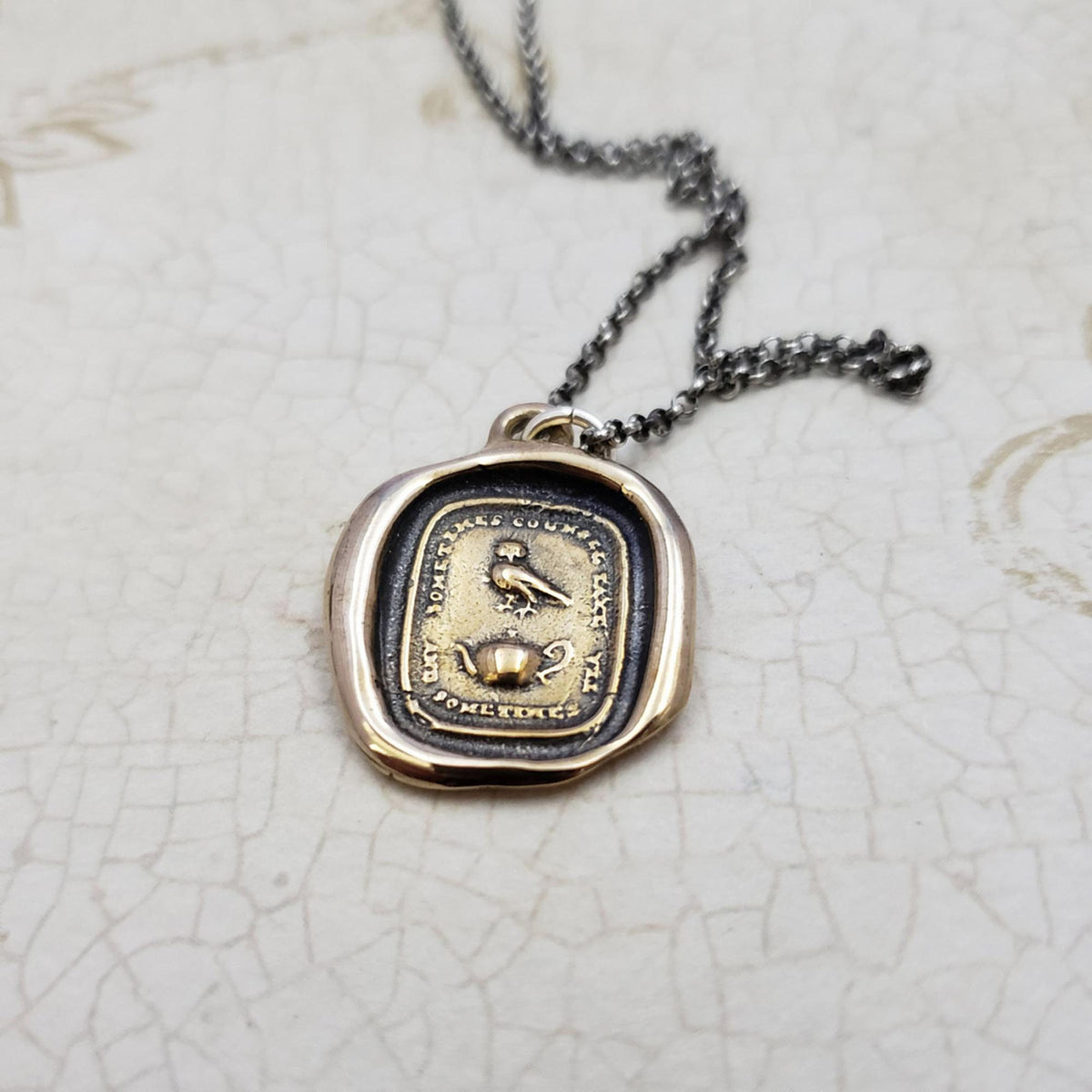 Council and Comfort, Owl and Teapot wax seal pendant in Bronze