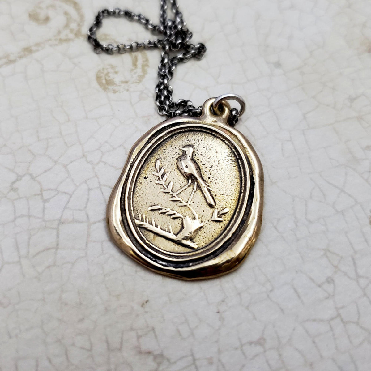 Robin on Branch  - Spring Constancy - in Bronze