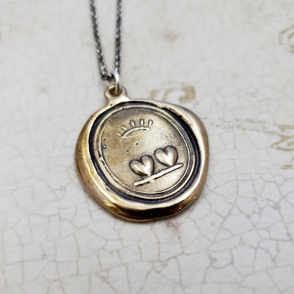 Loyalty and Love Crowned Hearts Wax Seal Necklace in Bronze