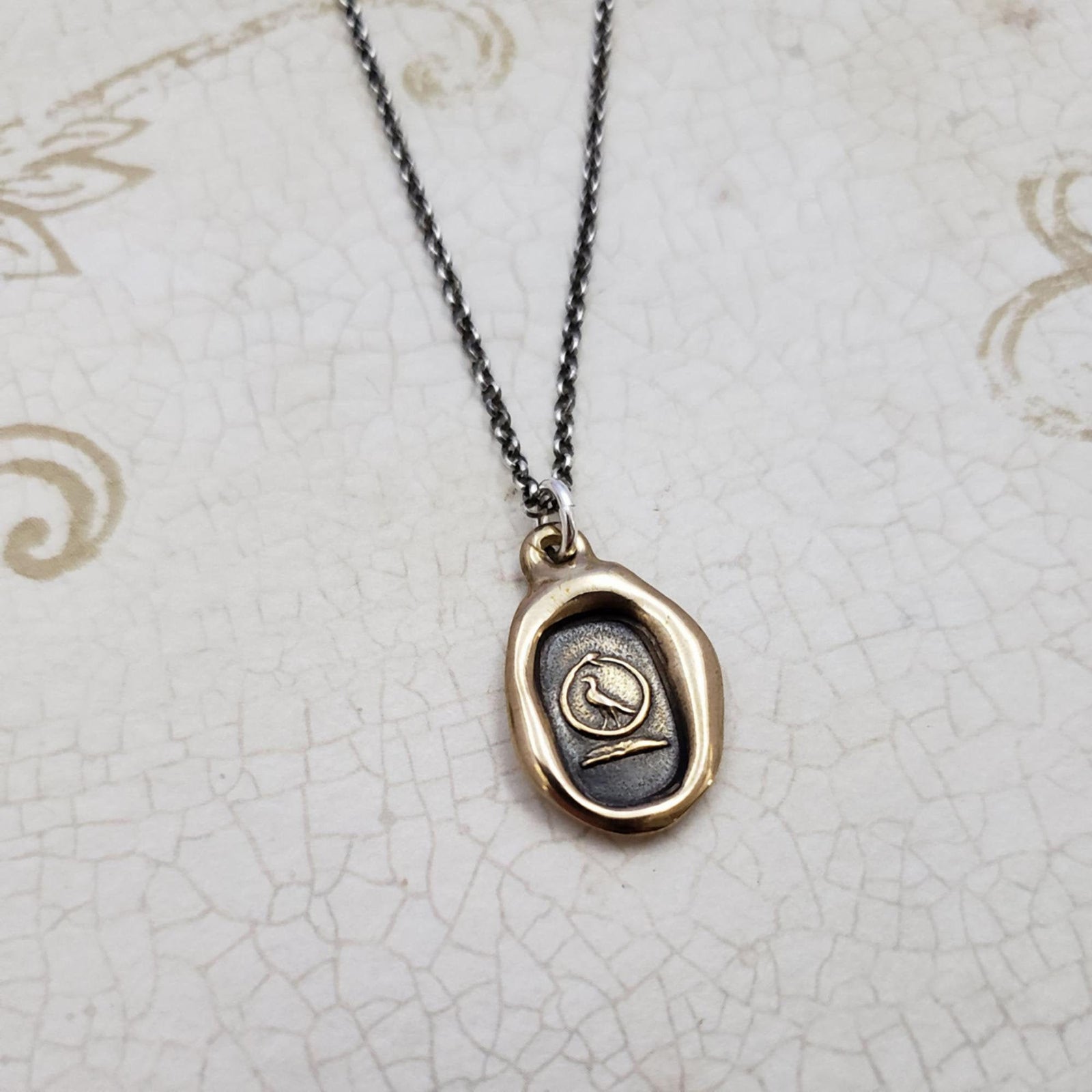 Swallow and Serpent  Eternal Loyalty Necklace in Bronze