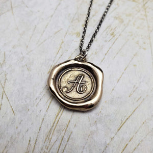 Initial A in Bronze