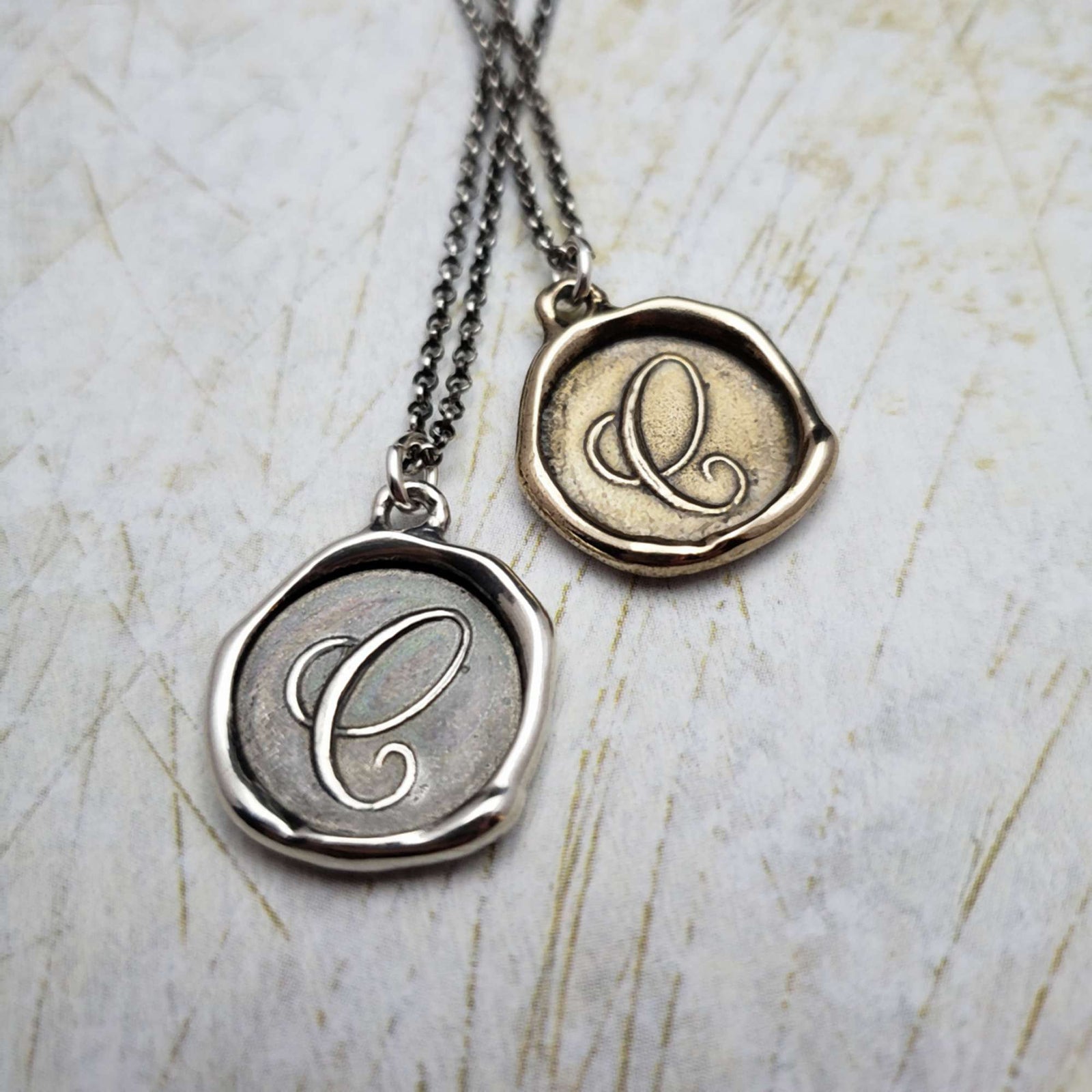 Initial C in Bronze