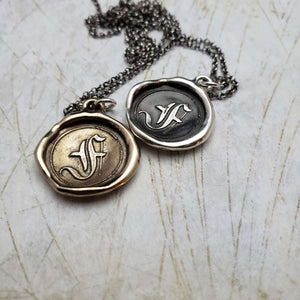 Initial F in Bronze