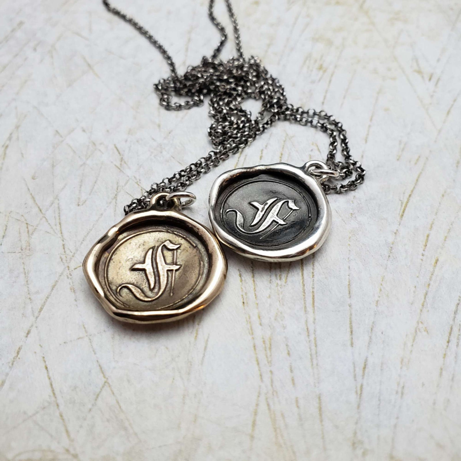 Initial F in Bronze