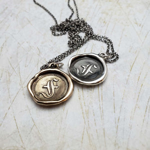 Initial F in Bronze