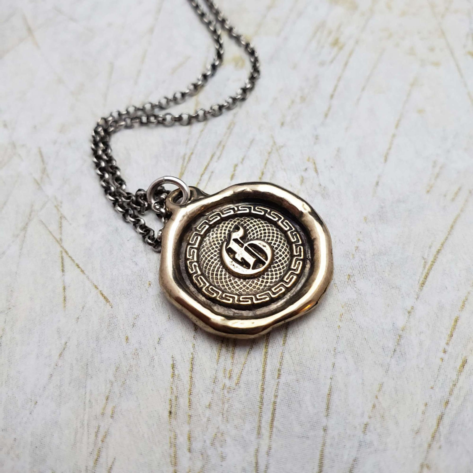 Letter G in Bronze