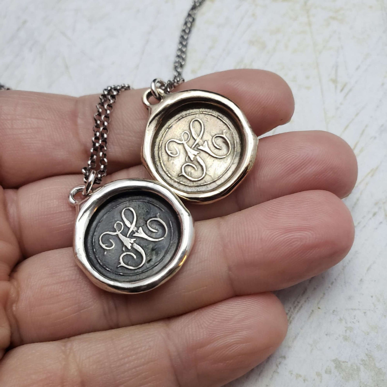 Initial H in Bronze