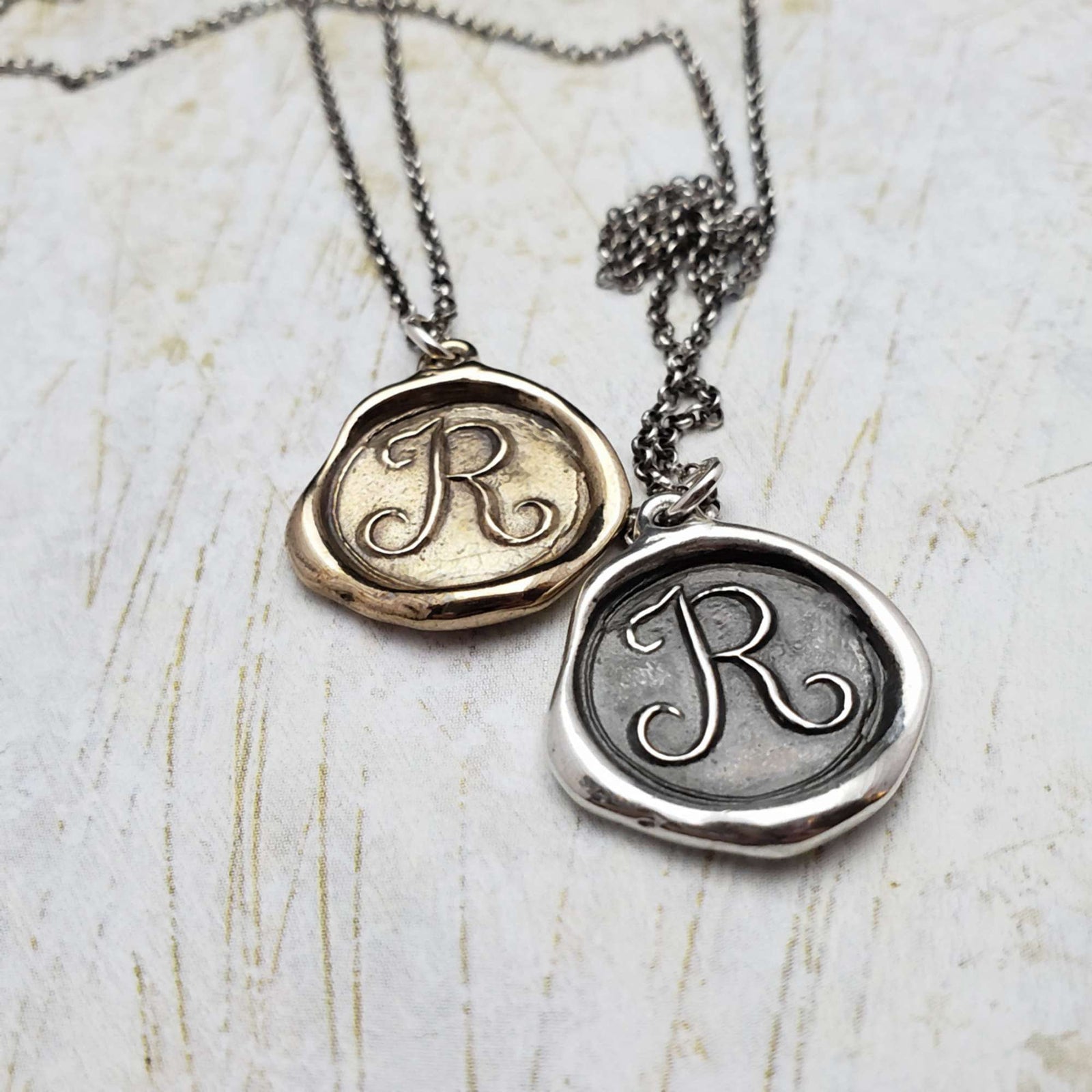 Initial R in Bronze