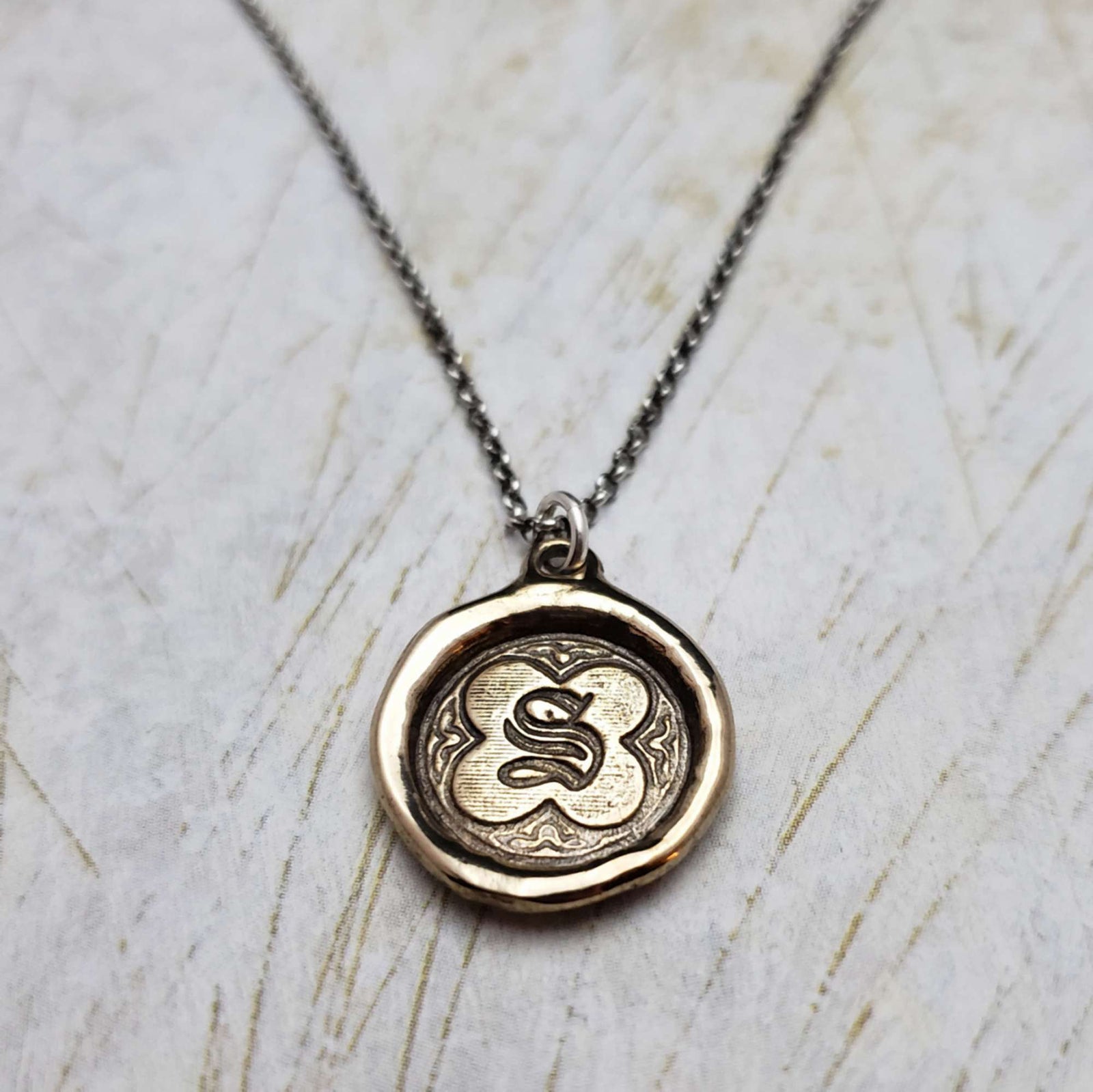 Initial S in Bronze