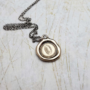 Initial O in Bronze