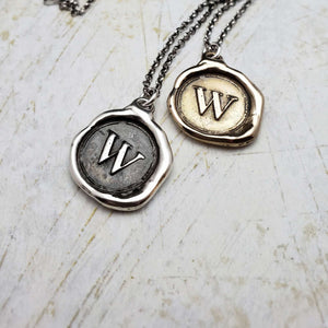 Initial W in Bronze