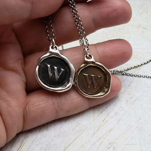 Initial W in Bronze
