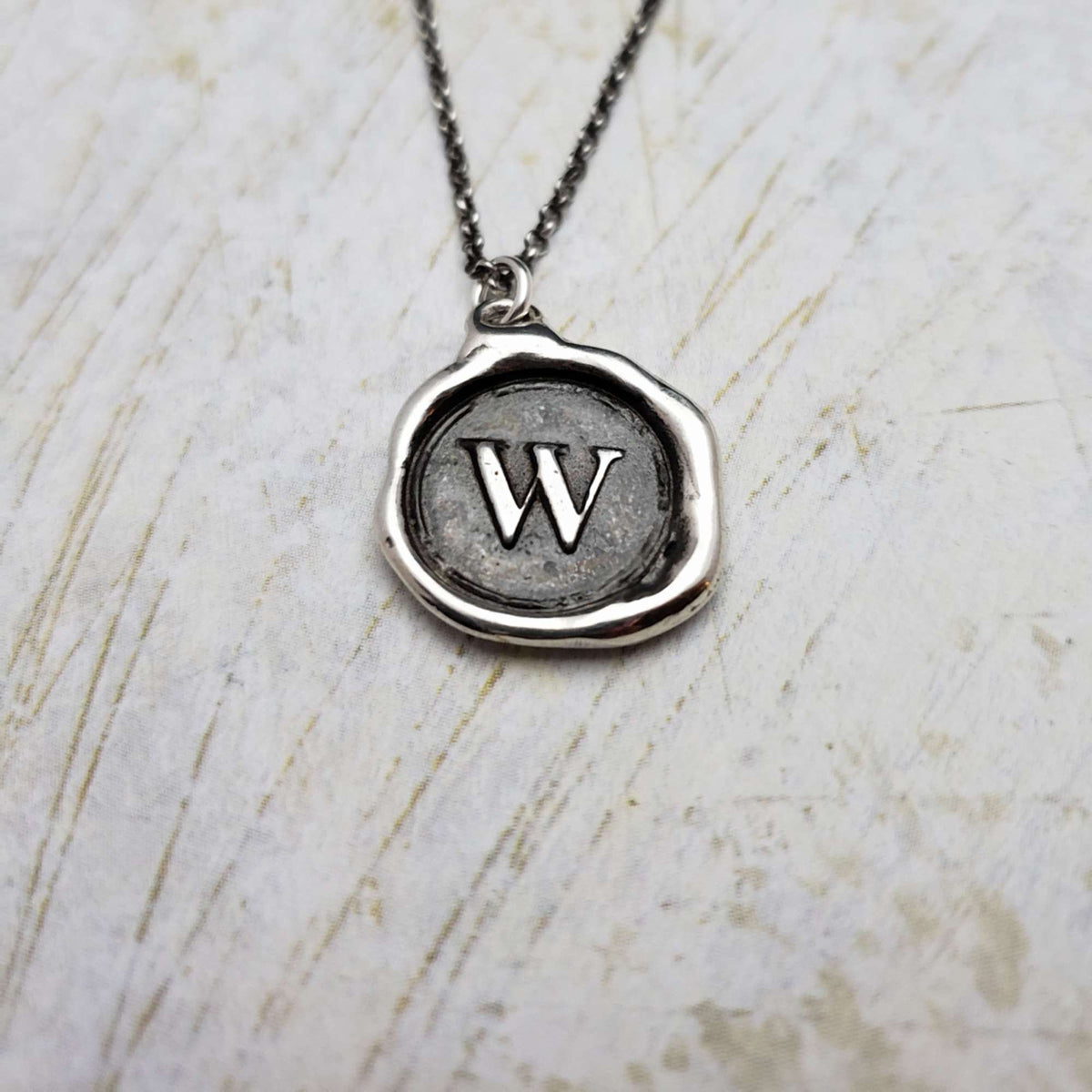 Initial W