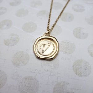 Letter V in gold vermeil