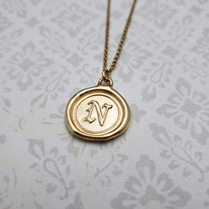 Letter N in gold vermeil