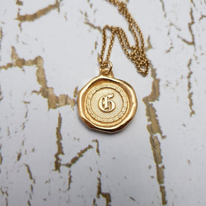 Letter G in gold vermeil