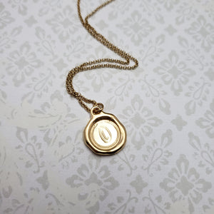 Letter O in gold vermeil