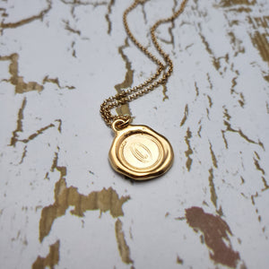 Letter O in gold vermeil