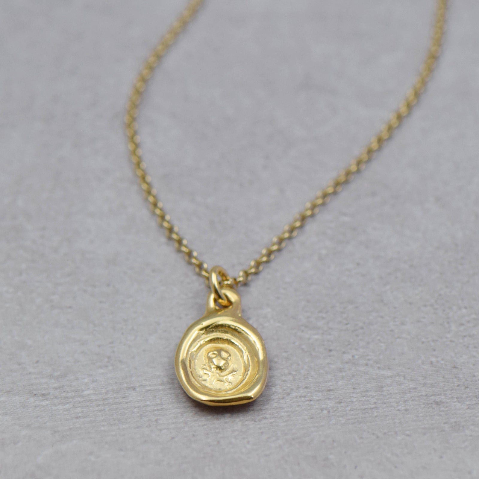 Skull and Crossbones - Memento Mori in Gold Vermeil